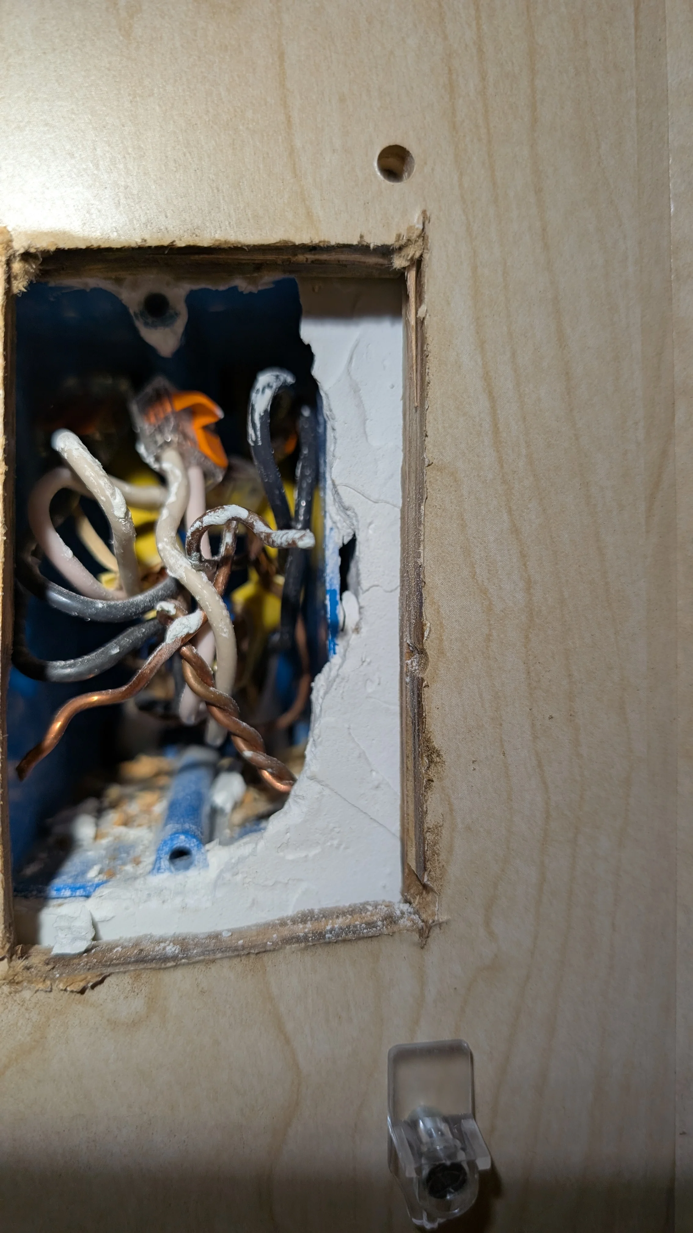 Electrical outlet box with organized color-coded wiring and copper connections